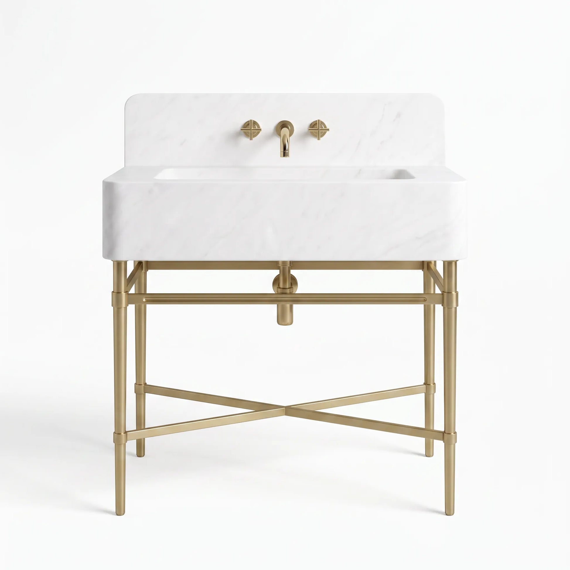 A freestanding bathroom sink with a white marble basin and backplate, supported by a gold-finished metal stand, featuring a matching gold faucet and two round wall-mounted controls.