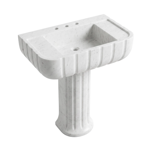 Bellagio custom Carrara White marble pedestal bathroom sink with sculpted fluted apron, fluted pedestal base, integrated basin, side deck grooves and three faucet holes
