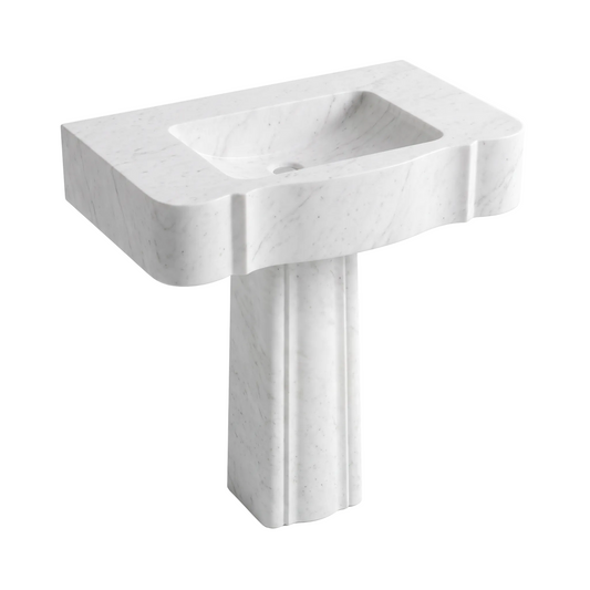 Cervano custom Carrara White marble pedestal bathroom sink with thick sculpted apron, integrated rectangular basin and vertically contoured pedestal