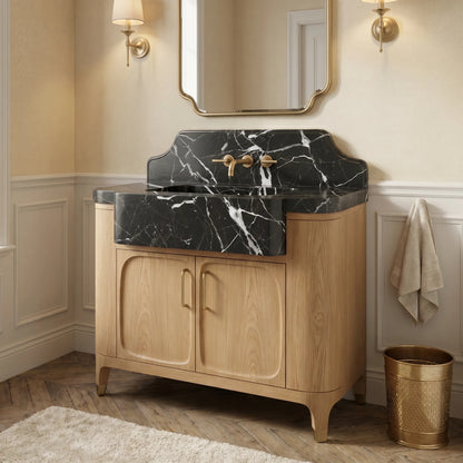 Custom black Nero Marquina marble bathroom vanity with integrated sink, marble backsplash and handcrafted oak cabinet