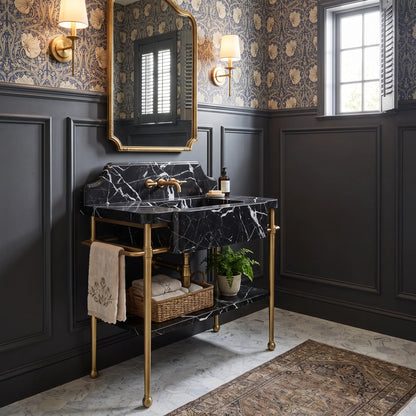 Element 30 inch Nero Marquina marble bathroom vanity with sink and solid brass console legs in a luxury bathroom