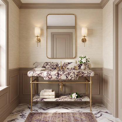 Halo 30 inch Calacatta Viola marble bathroom vanity with sink and solid brass console legs in a luxury bathroom