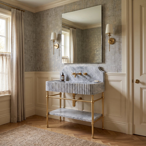 Imperial 30 inch Gray marble bathroom vanity with sink and solid brass console legs in a luxury bathroom