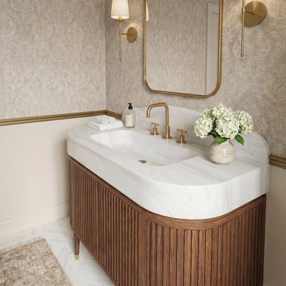 Lonsdale Carrara marble bathroom sink vanity with solid block sink, curved backsplash and handcrafted walnut cabinet