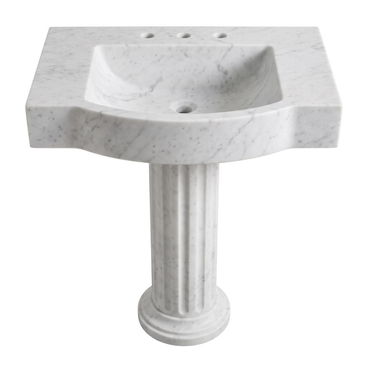 Monteluce custom Carrara White marble pedestal bathroom sink with integrated basin, sculpted curved front apron, fluted column pedestal and three faucet holes