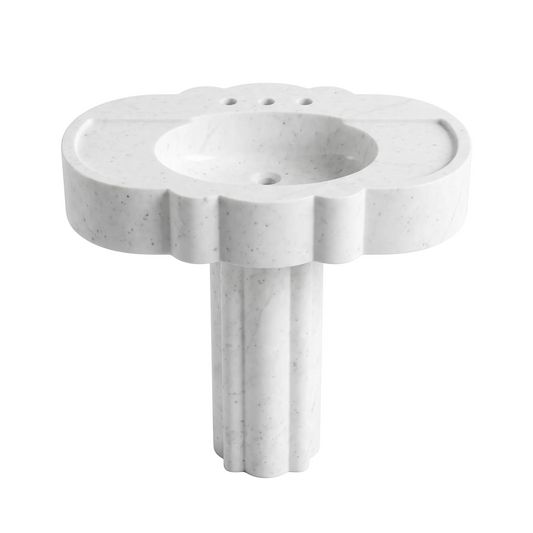 Monteluce custom Carrara White marble pedestal bathroom sink with scalloped sculptural edges, integrated oval basin, three faucet holes and carved pedestal base