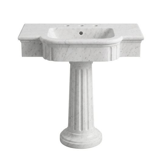 Montreux custom Carrara White marble pedestal bathroom sink with fluted column base, sculpted curved front apron, three faucet holes and overflow