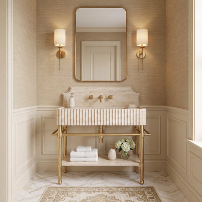 Noble 30 inch Travertine marble bathroom vanity with sink and solid brass console legs in a luxury bathroom