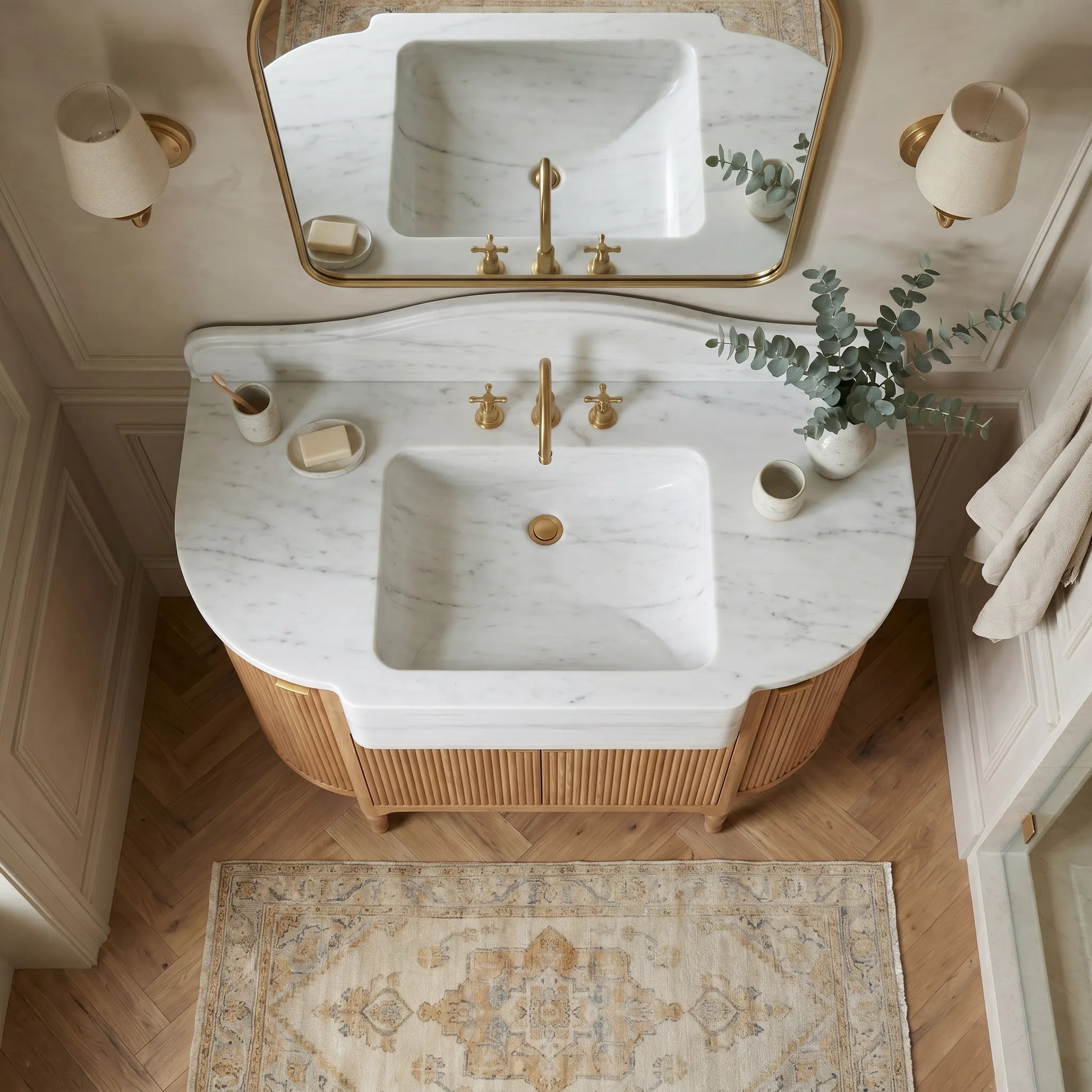 Norbourne Carrara marble bathroom sink vanity with sculptural backsplash and handcrafted fluted oak cabinet