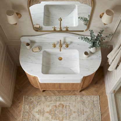 Norbourne Carrara marble bathroom sink vanity with sculptural backsplash and handcrafted fluted oak cabinet