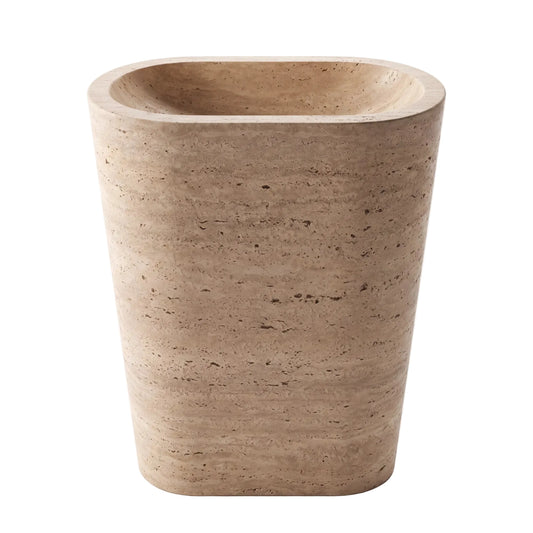 Norvick natural travertine pedestal bathroom sink with integrated basin, rounded corners and tapered monolithic form