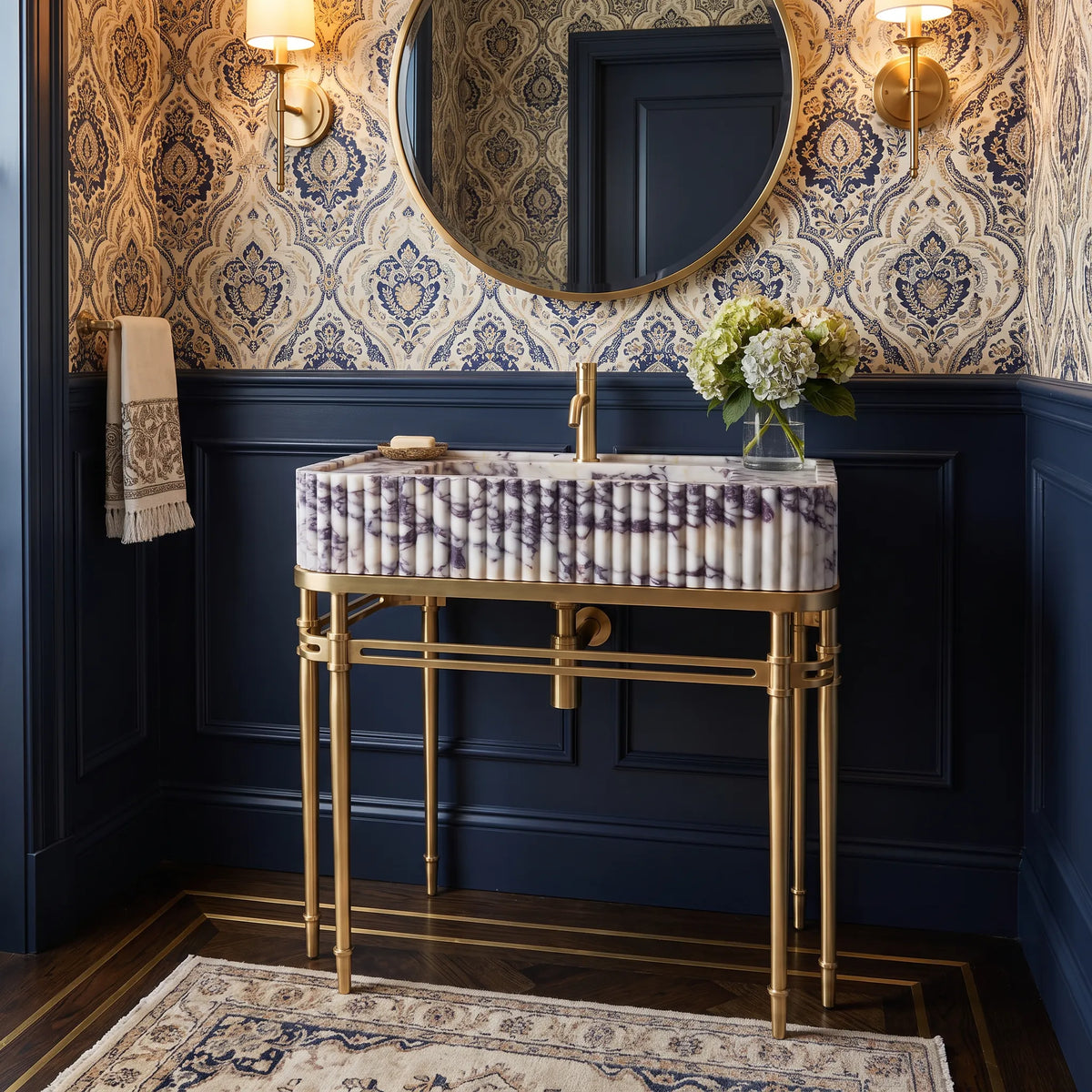 Ravella 30 inch Calacatta Viola marble bathroom vanity sink with solid brass console legs in a luxury bathroom