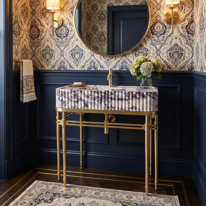Ravella 30 inch Calacatta Viola marble bathroom vanity sink with solid brass console legs in a luxury bathroom