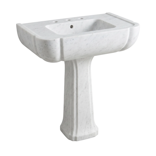 Ravello custom Carrara White marble pedestal bathroom sink with sculpted curved apron, tapered pedestal, three faucet holes, overflow and recessed side deck detail