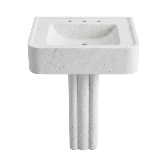 Valerio custom Carrara White marble pedestal bathroom sink with thick rounded basin, carved triple-fluted pedestal, three faucet holes and integrated side deck grooves