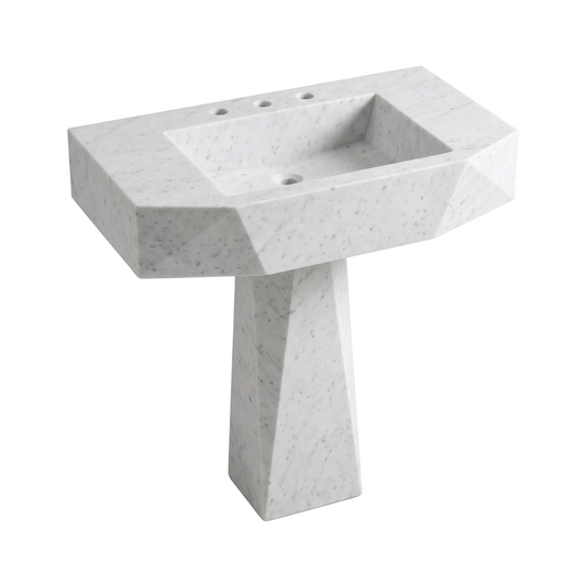 Varello custom Carrara White marble pedestal bathroom sink with geometric faceted apron, rectangular integrated basin and tapered pedestal base