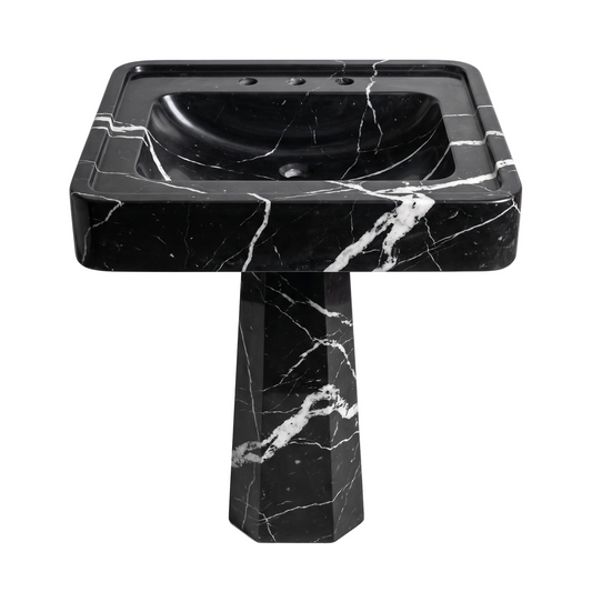 Vercelli custom Nero Marquina marble pedestal bathroom sink with integrated rectangular basin, raised rim and sculptural tapered pedestal