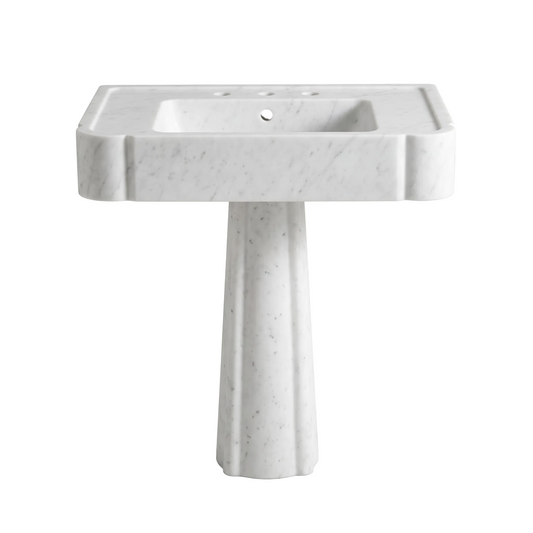 Westmere custom Carrara White marble pedestal bathroom sink with thick rectangular basin, sculpted front corners, three faucet holes and tapered pedestal base